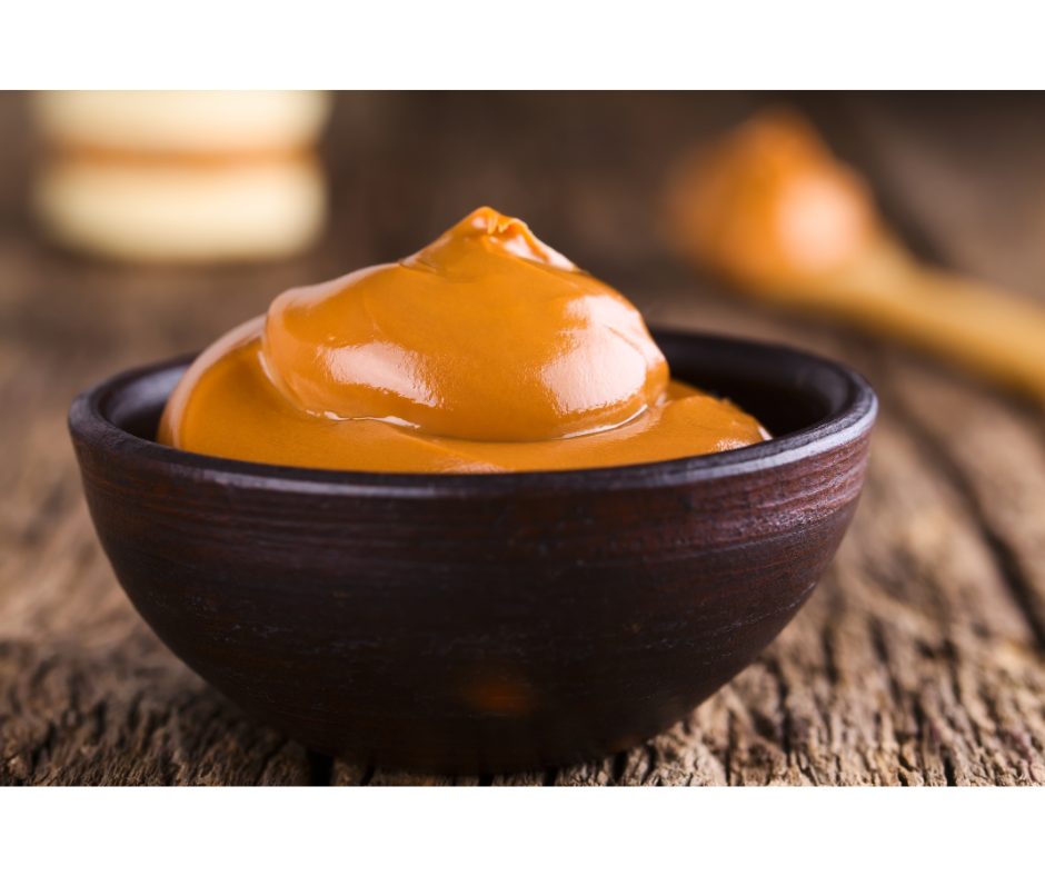 Receitas com doce de leite: aprenda a fazer | Foto de um pote com doce de leite | Atacadão